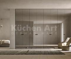 Dressing épuré avec armoire à Miroir Personnalisable | Optimisation d'Espace et Design Moderne